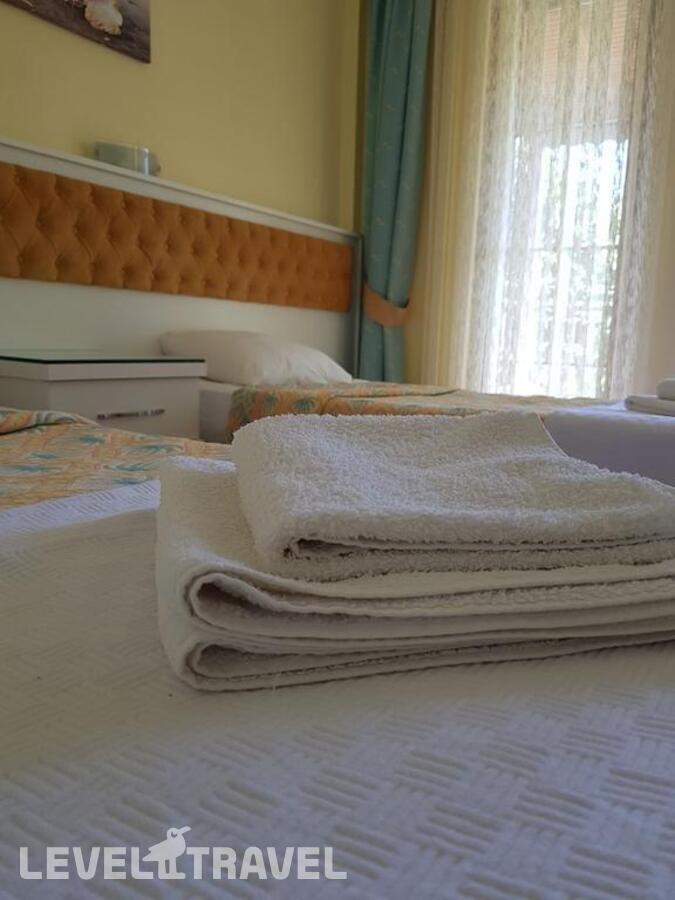 фотографии номера Стандартный номер отеля Ilkiz Beach Hotel в Турция(Олюдениз) - фото №5