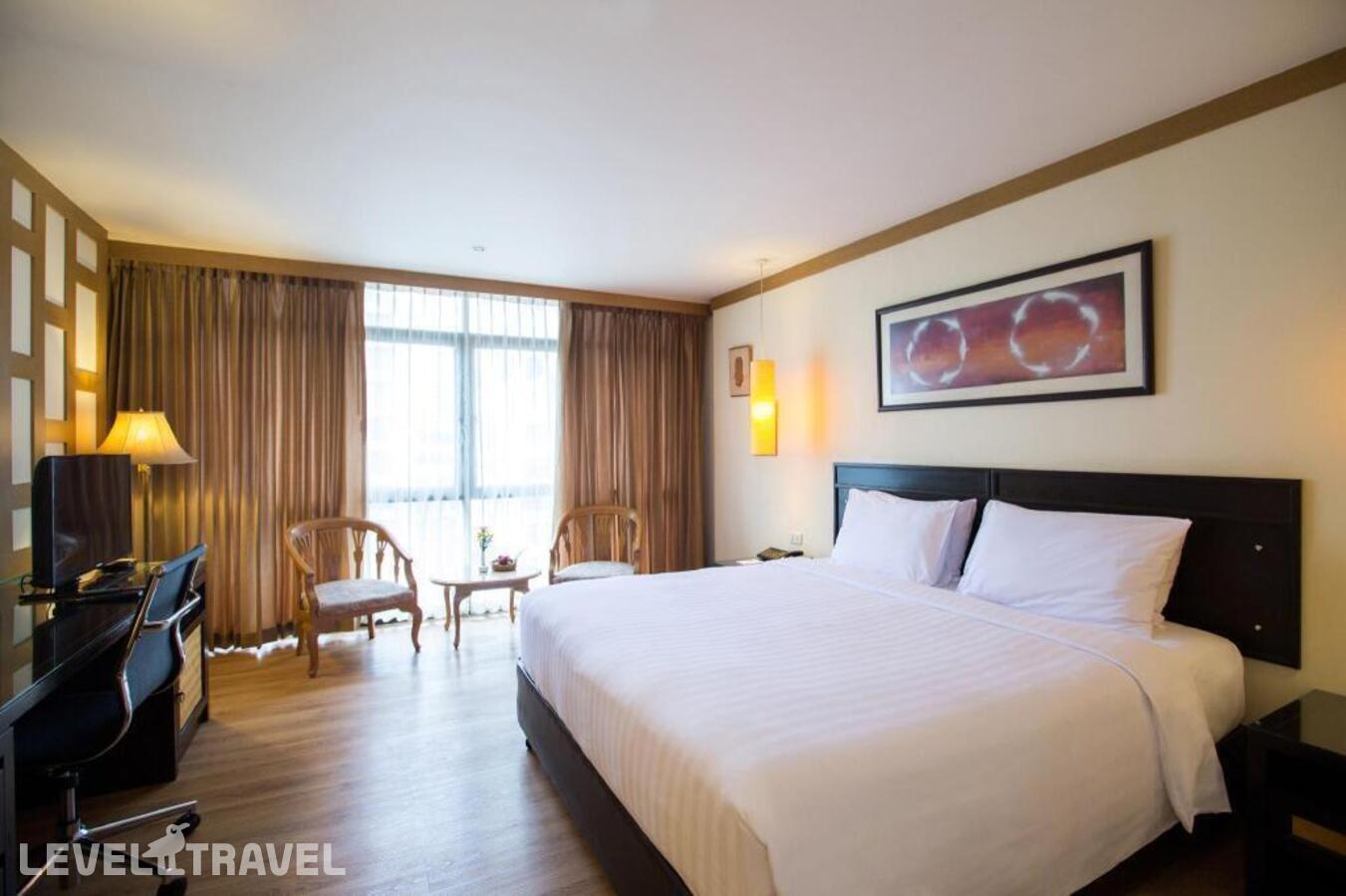 фотографии номера Делюкс отеля The Tarntawan Hotel Surawong Bangkok в Таиланд(Бангкок) - фото №1
