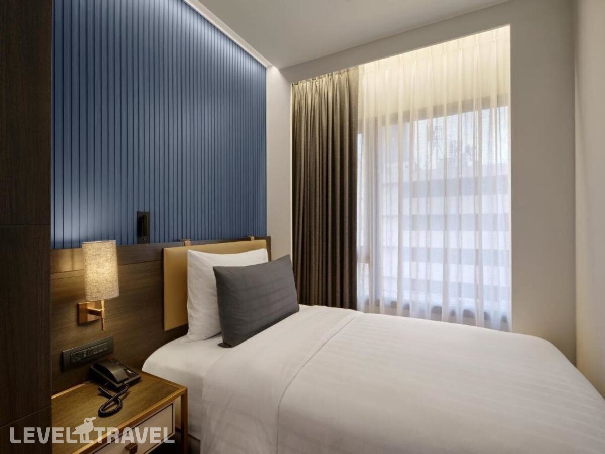 фотографии номера Люкс (2 комнаты) отеля Sindhorn Midtown Hotel Bangkok, Vignette Collection - an IHG Hotel в Таиланд(Бангкок) - фото №10