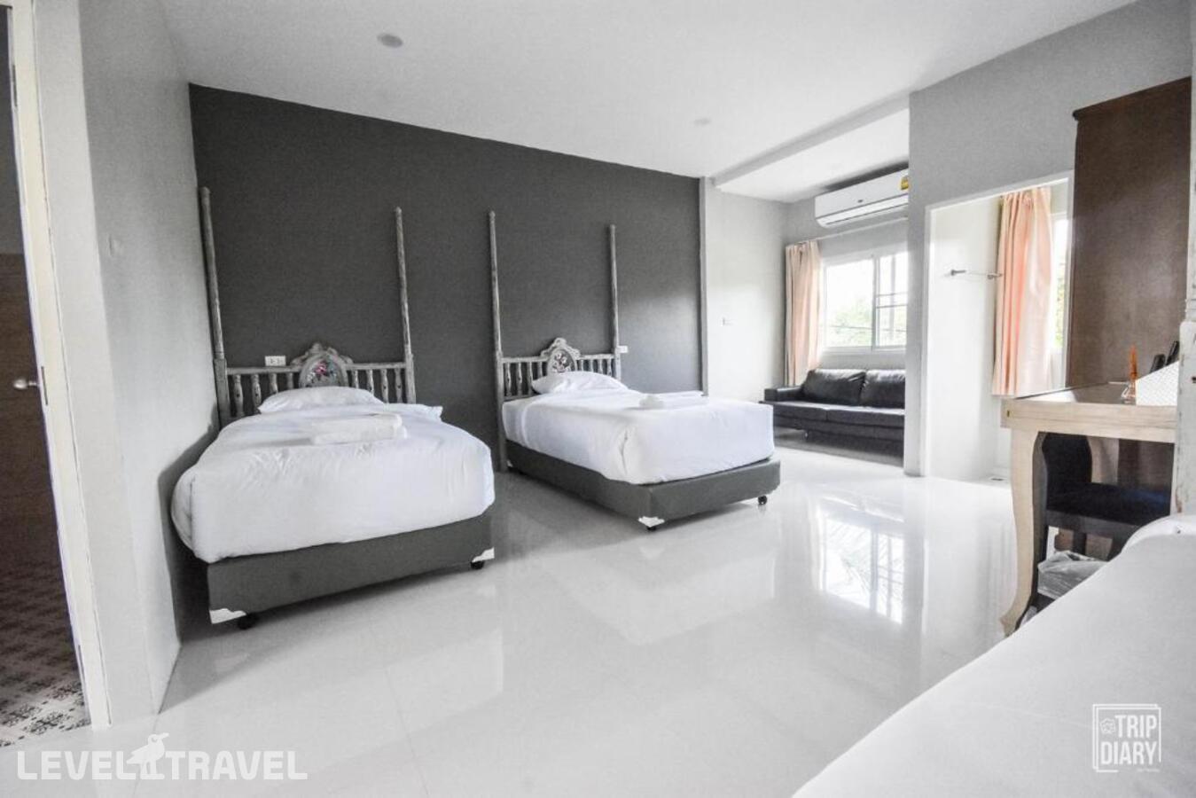 фотографии номера Четырехместный делюкс отеля Phuket Nonnita Boutique Resort в Таиланд(город Пхукет) - фото №1