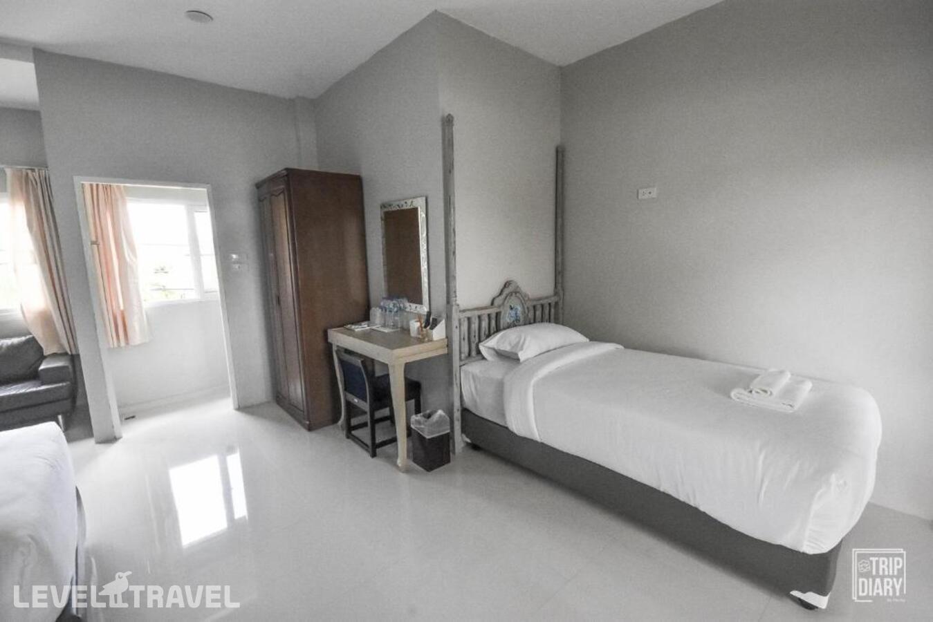 фотографии номера Четырехместный делюкс отеля Phuket Nonnita Boutique Resort в Таиланд(город Пхукет) - фото №2