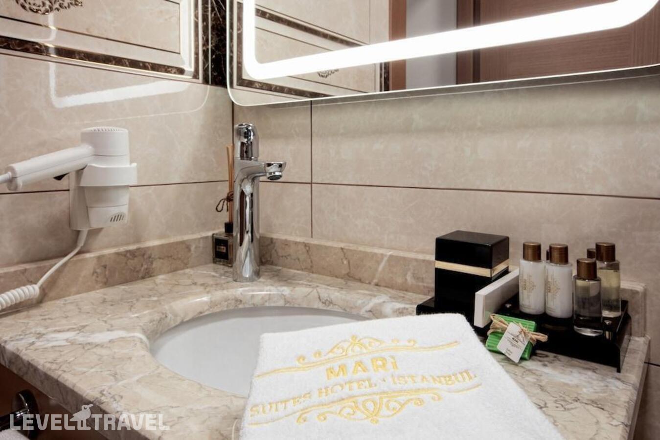 фотографии номера Трехместный номер отеля Mari Suites Hotel в Турция(Кягытхане) - фото №7