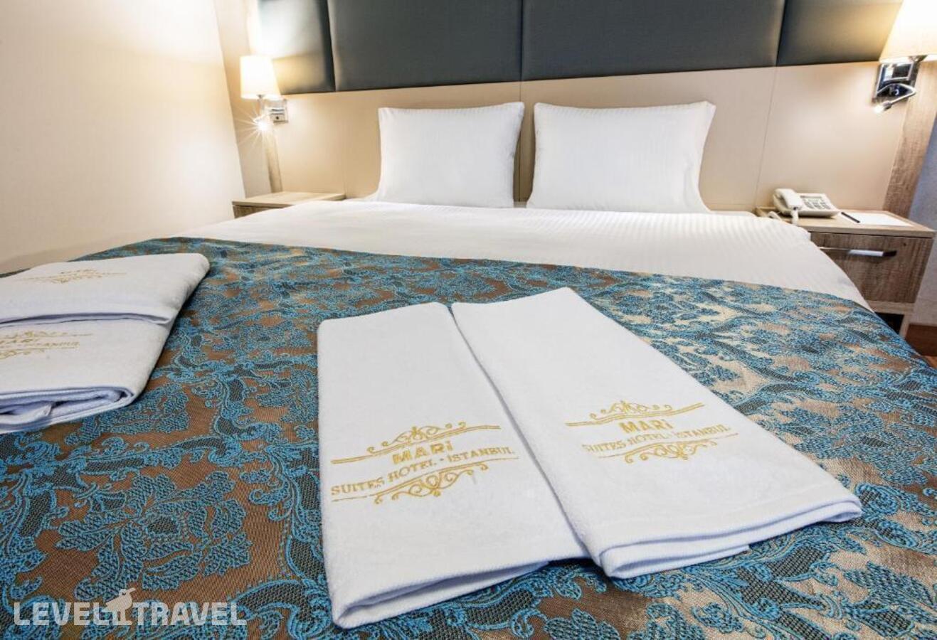 фотографии номера Трехместный номер отеля Mari Suites Hotel в Турция(Кягытхане) - фото №2