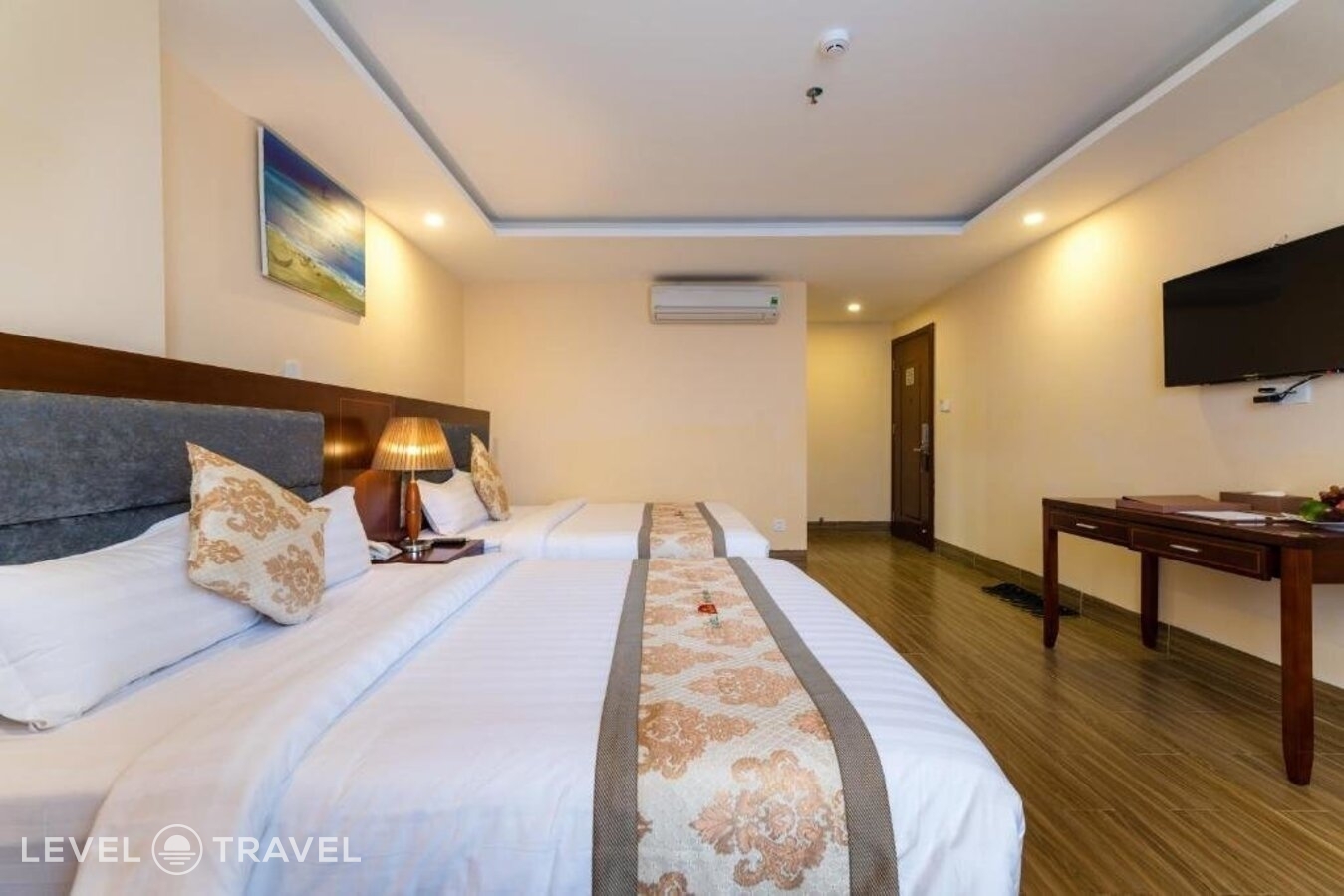 фотографии номера Четырехместный делюкс отеля Nhat Minh Hotel and Apartment в Вьетнам(Дананг) - фото №4