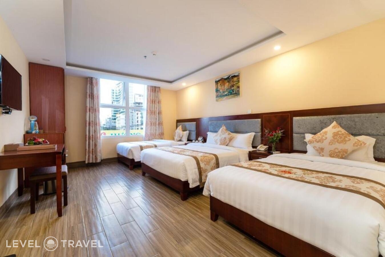 фотографии номера Трехместный делюкс отеля Nhat Minh Hotel and Apartment в Вьетнам(Дананг) - фото №6