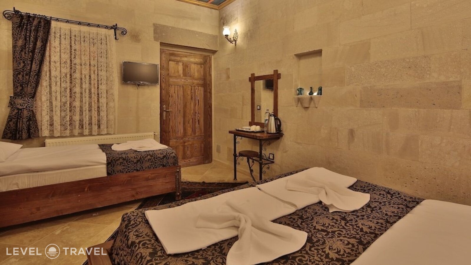 фотографии номера Трехместный делюкс отеля Cappadocia Cave Land Hotel в Турция(Гёреме) - фото №5