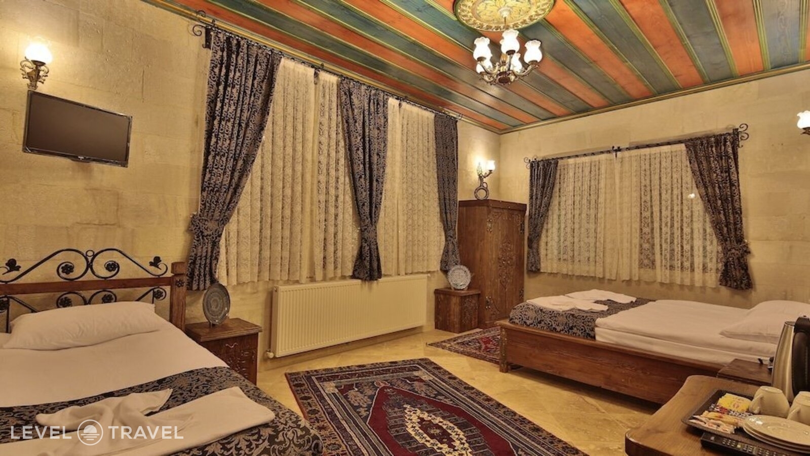 фотографии номера Трехместный делюкс отеля Cappadocia Cave Land Hotel в Турция(Гёреме) - фото №2