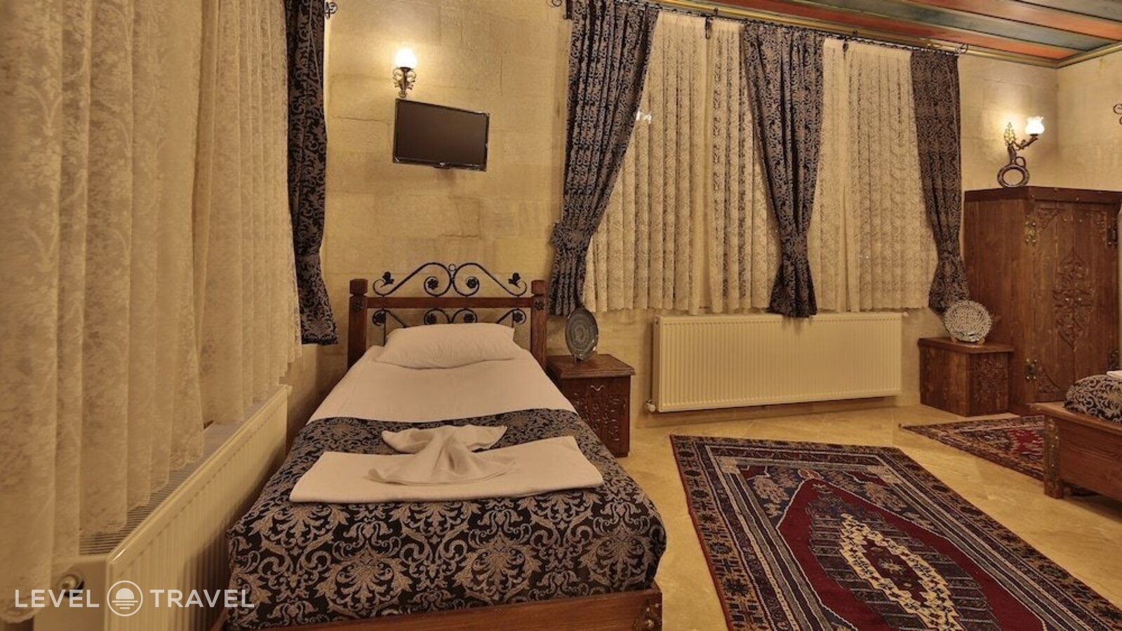 фотографии номера Трехместный делюкс отеля Cappadocia Cave Land Hotel в Турция(Гёреме) - фото №3