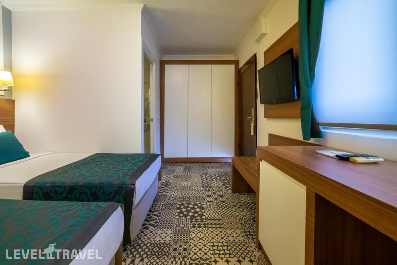 фотографии номера Экономичный номер отеля Armas Beach Hotel в Турция(Кемер - центр) - фото №2
