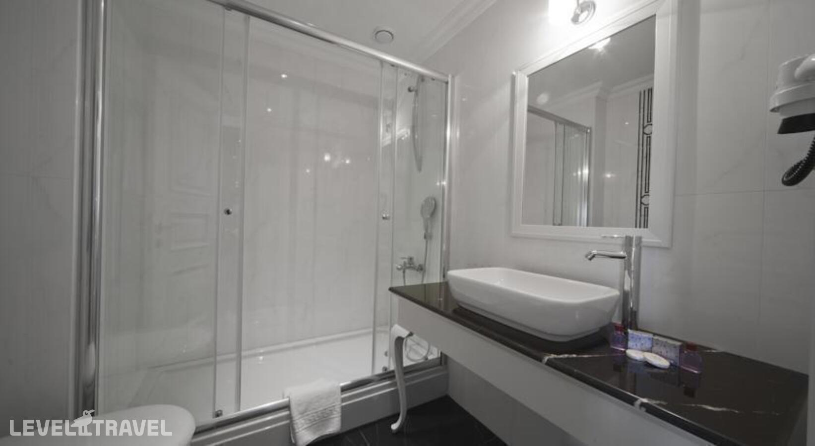 фотографии номера Улучшенный номер отеля Aren Suites Hotel в Турция(Фатих) - фото №8