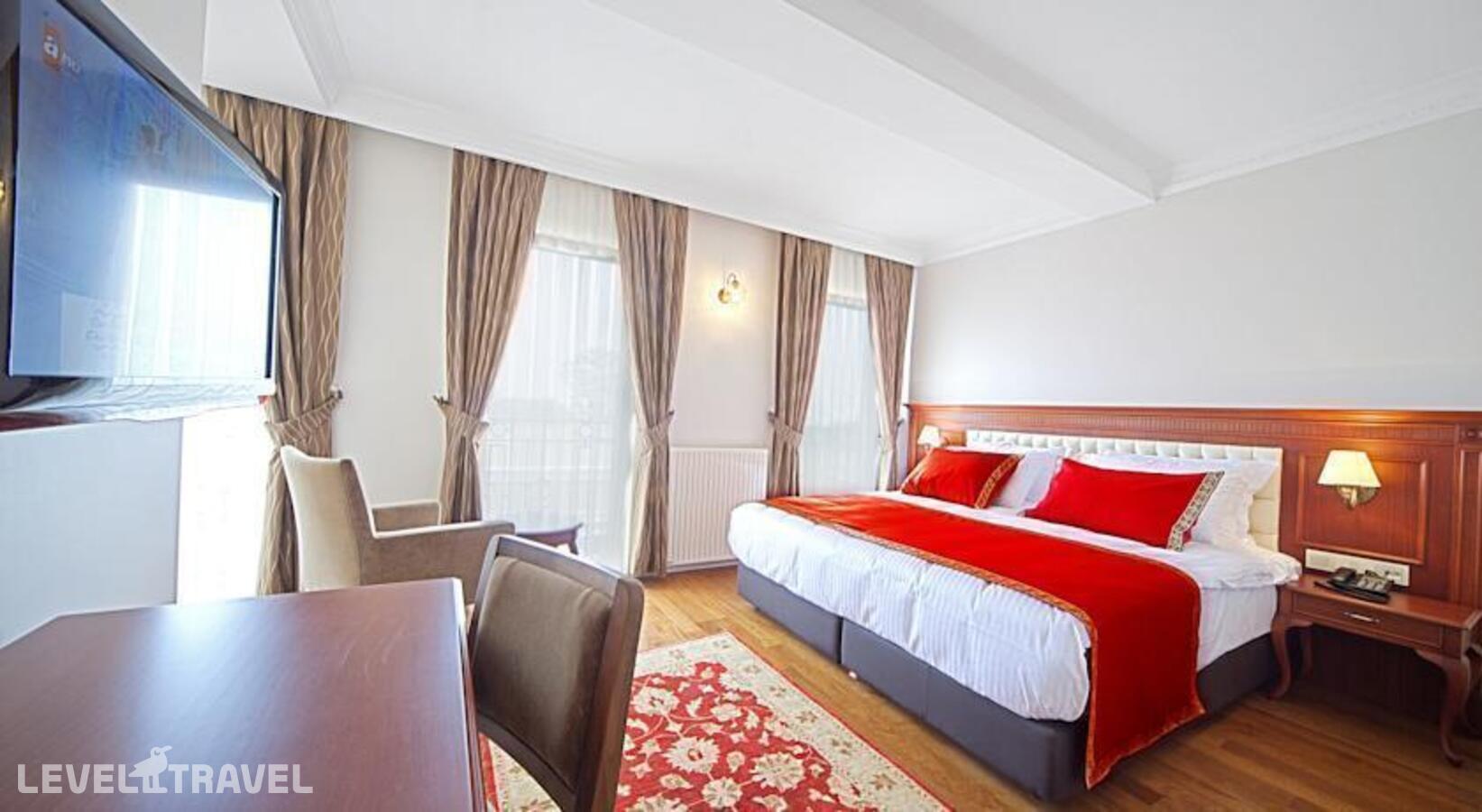 фотографии номера Улучшенный номер отеля Aren Suites Hotel в Турция(Фатих) - фото №2