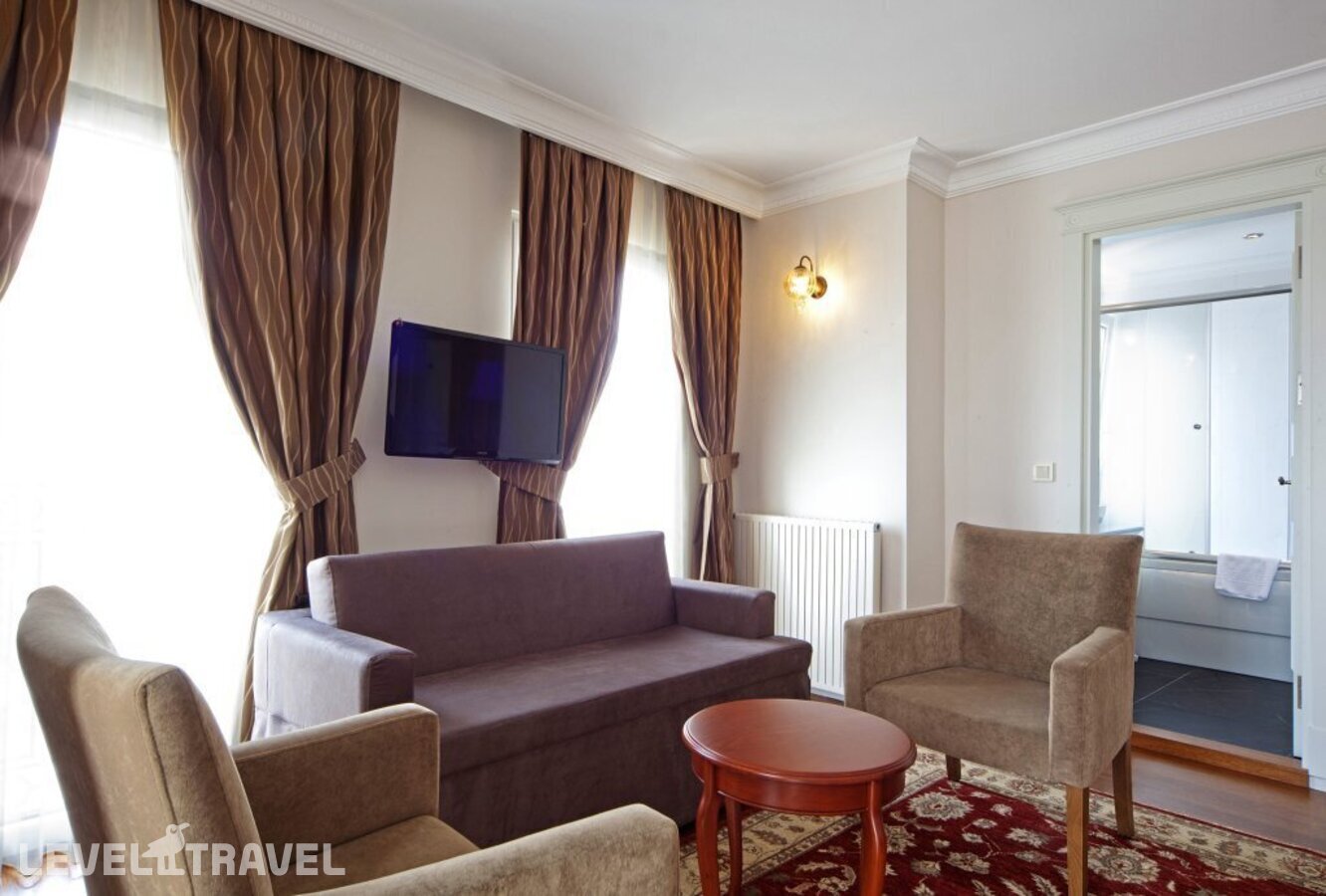 фотографии номера Четырехместный улучшенный отеля Aren Suites Hotel в Турция(Фатих) - фото №23