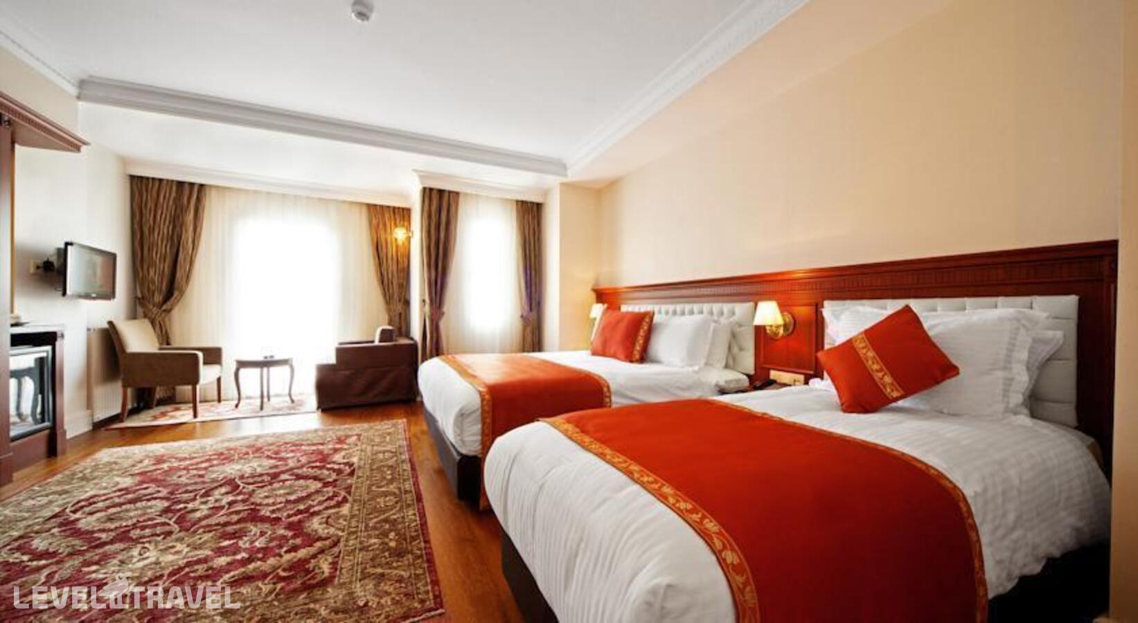 фотографии номера Четырехместный улучшенный отеля Aren Suites Hotel в Турция(Фатих) - фото №2