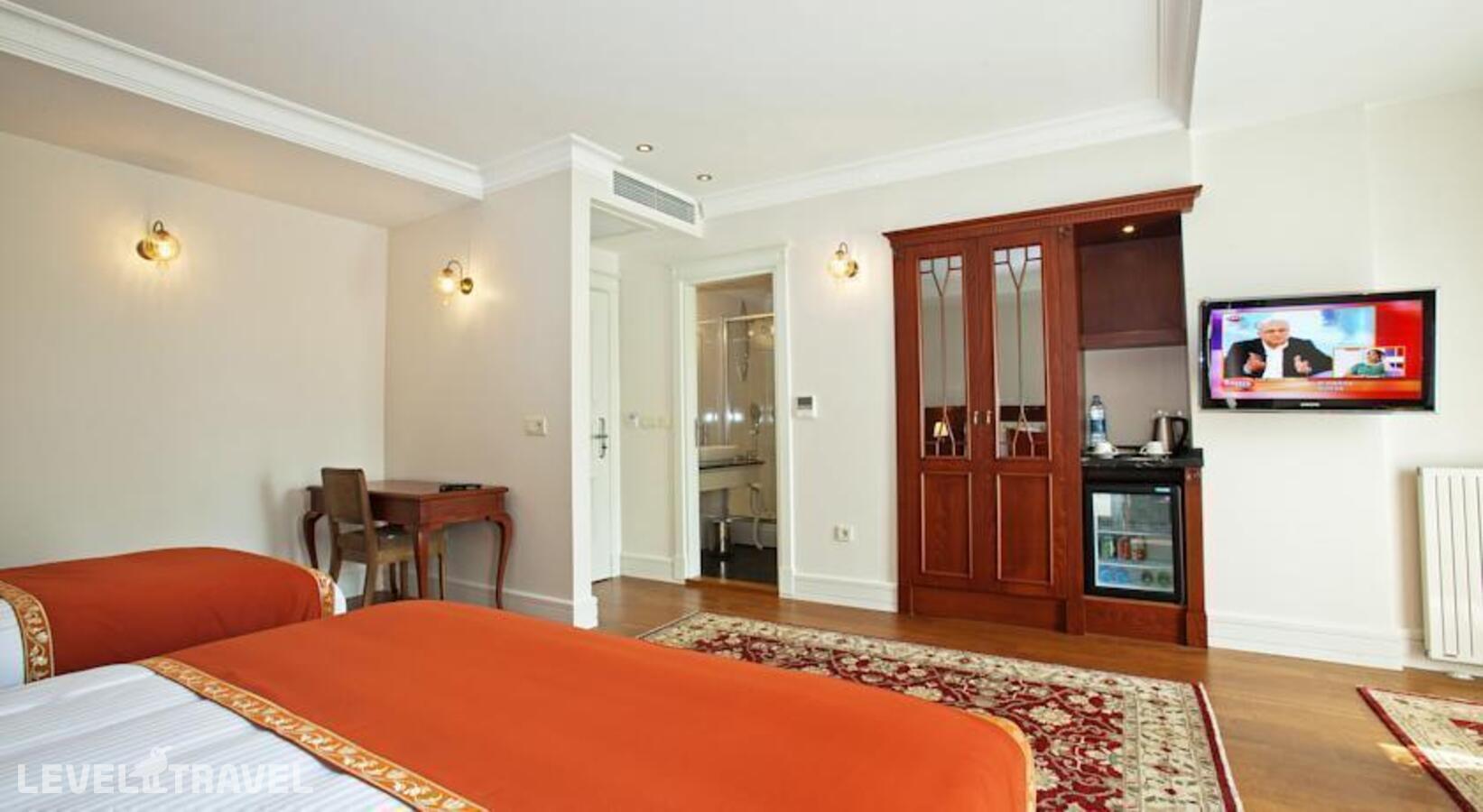 фотографии номера Четырехместный улучшенный отеля Aren Suites Hotel в Турция(Фатих) - фото №1