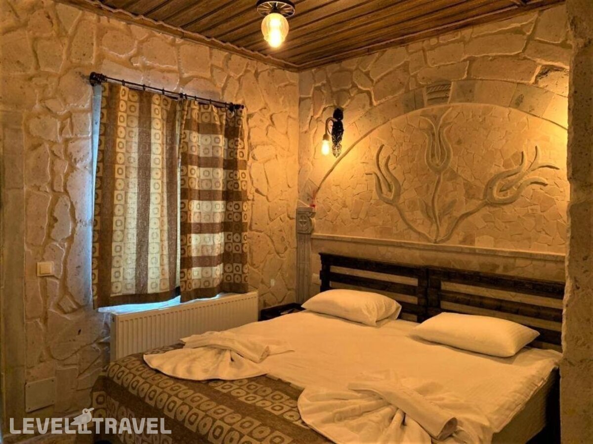 фотографии номера Стандартный номер отеля Cappadocia Caves Hotel в Турция(Гёреме) - фото №3