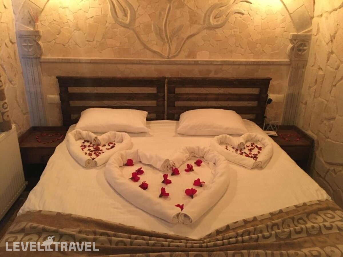 фотографии номера Стандартный номер отеля Cappadocia Caves Hotel в Турция(Гёреме) - фото №1
