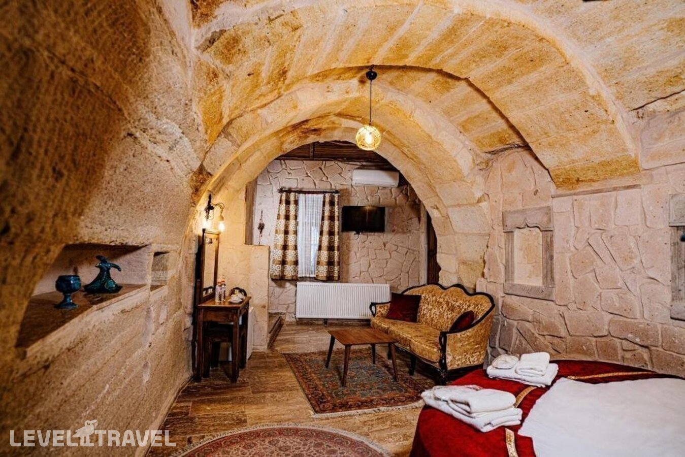 фотографии номера Делюкс отеля Cappadocia Caves Hotel в Турция(Гёреме) - фото №3
