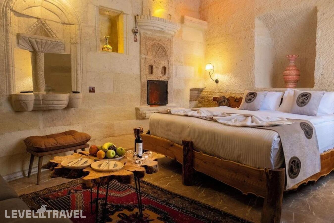 фотографии номера Улучшенный номер отеля Urgup Evi Cave Hotel в Турция(Ургюп) - фото №7