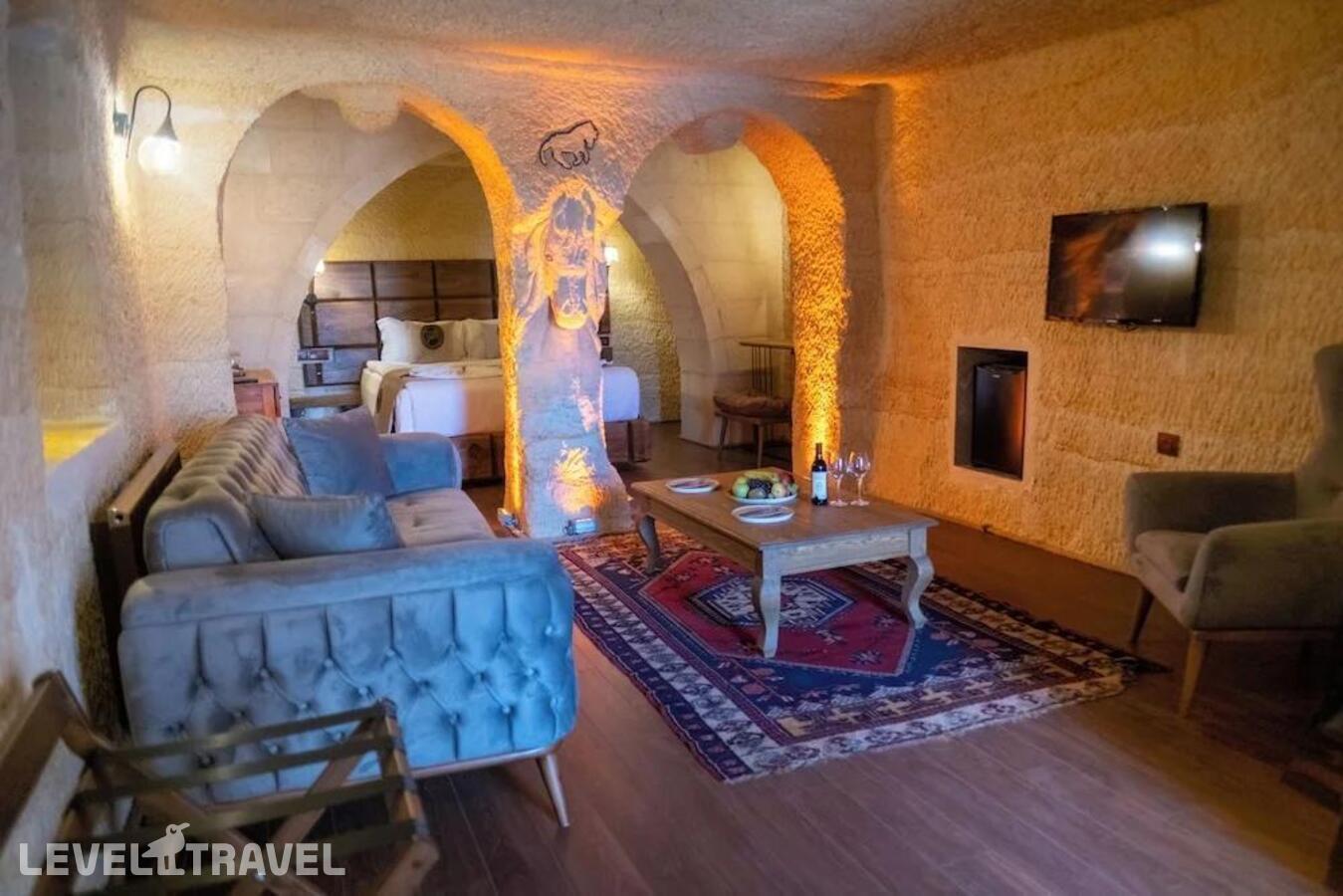 фотографии номера Улучшенный номер отеля Urgup Evi Cave Hotel в Турция(Ургюп) - фото №1
