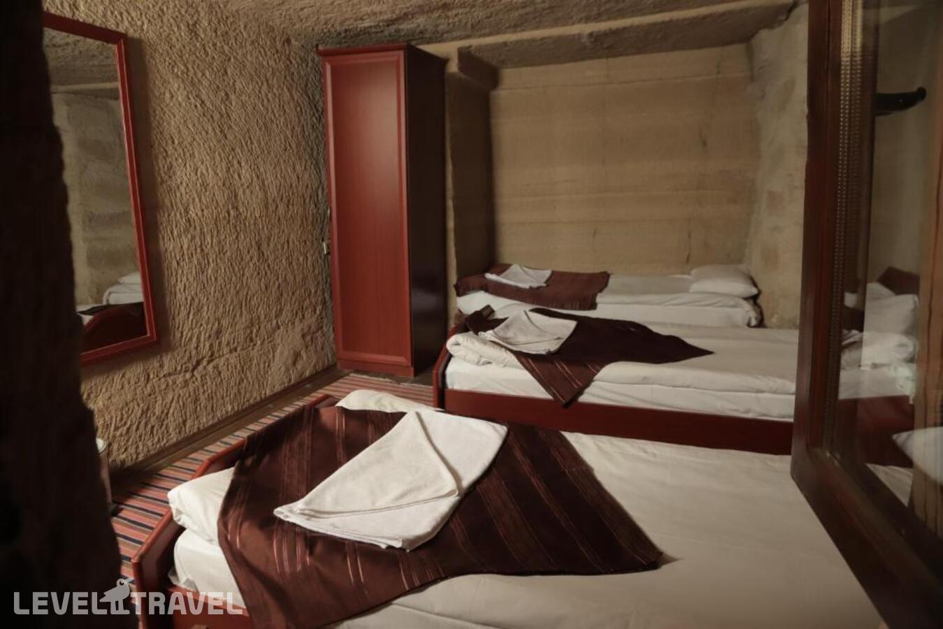 фотографии номера Стандартный номер отеля Guven Cave Hotel в Турция(Гёреме) - фото №4