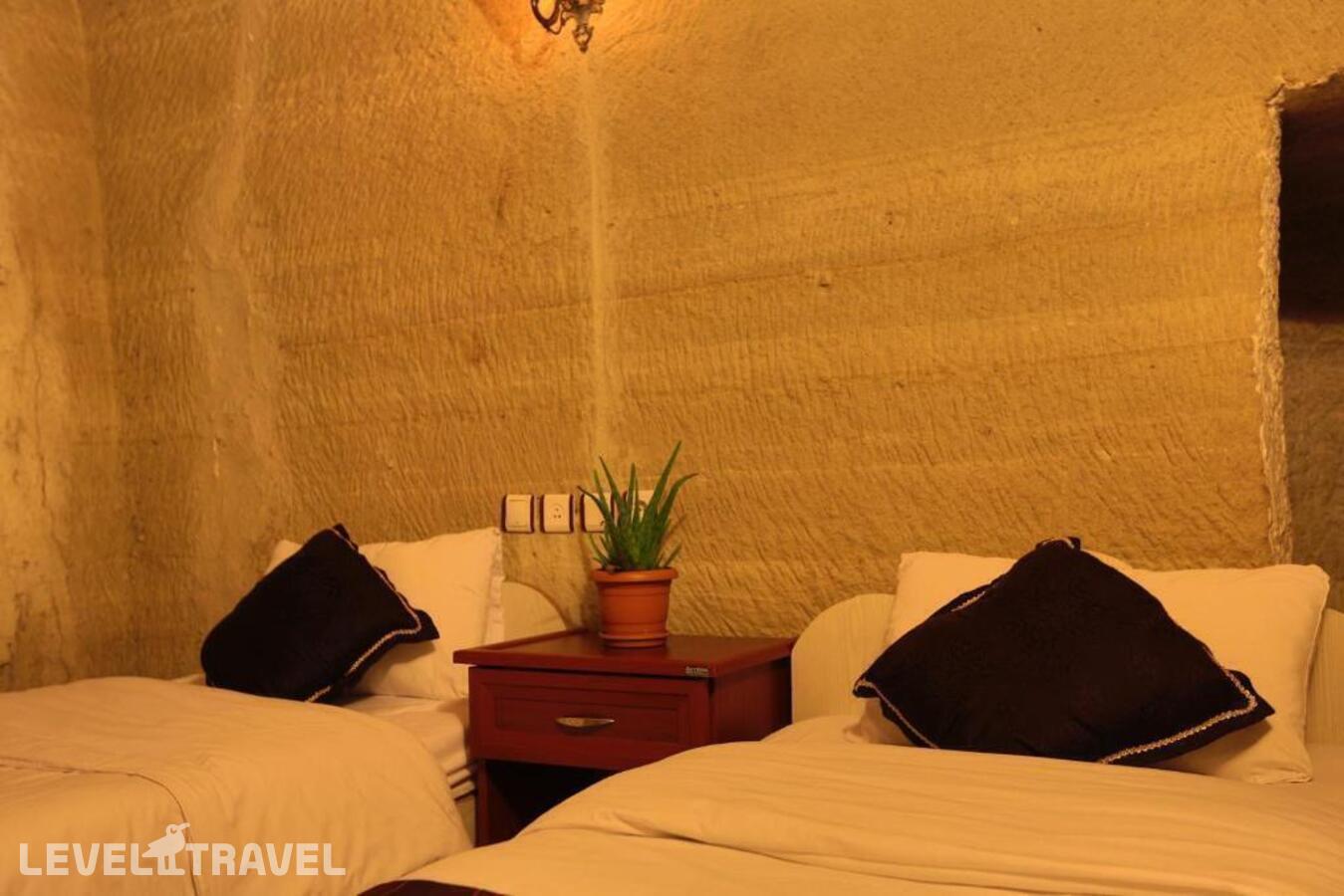 фотографии номера Стандартный номер отеля Guven Cave Hotel в Турция(Гёреме) - фото №1