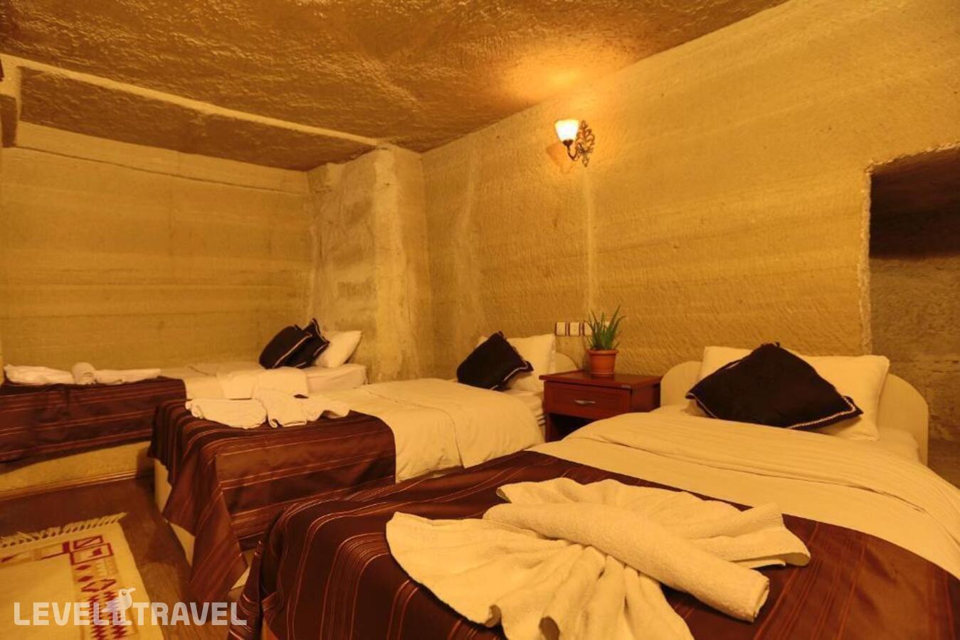 фотографии номера Стандартный номер отеля Guven Cave Hotel в Турция(Гёреме) - фото №2