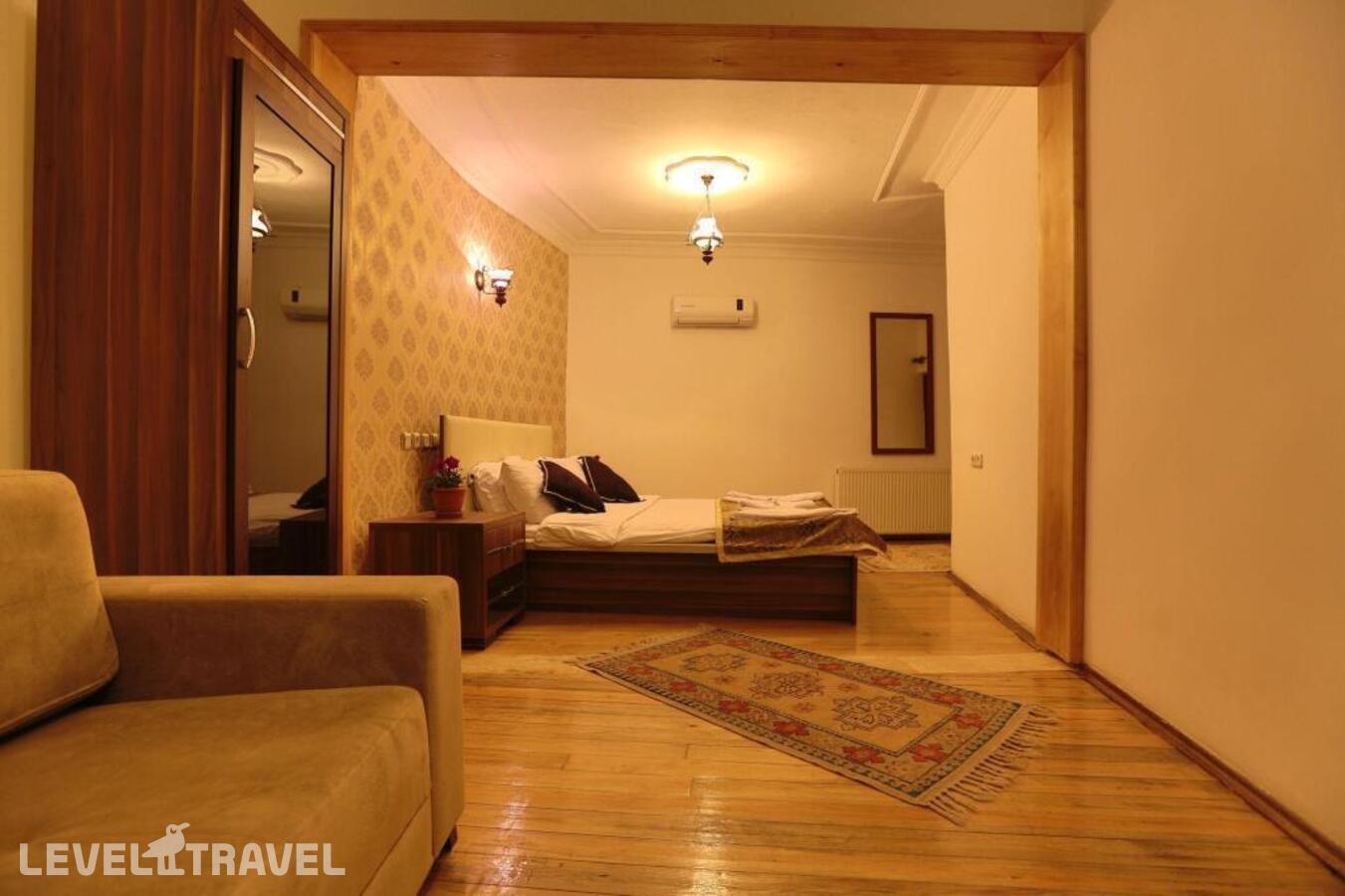 фотографии номера Делюкс отеля Guven Cave Hotel в Турция(Гёреме) - фото №1