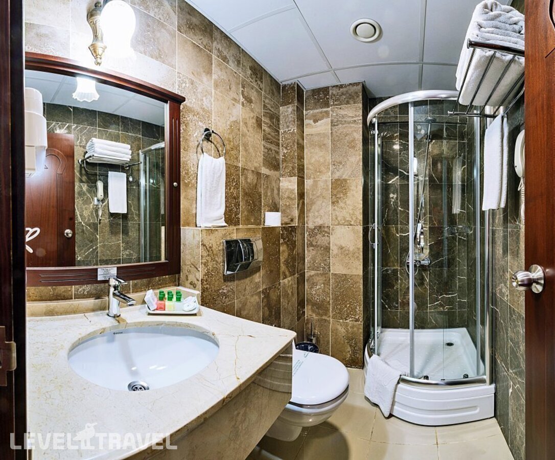фотографии номера Одноместный улучшенный отеля Gulhanepark Hotel в Турция(Сиркеджи) - фото №11