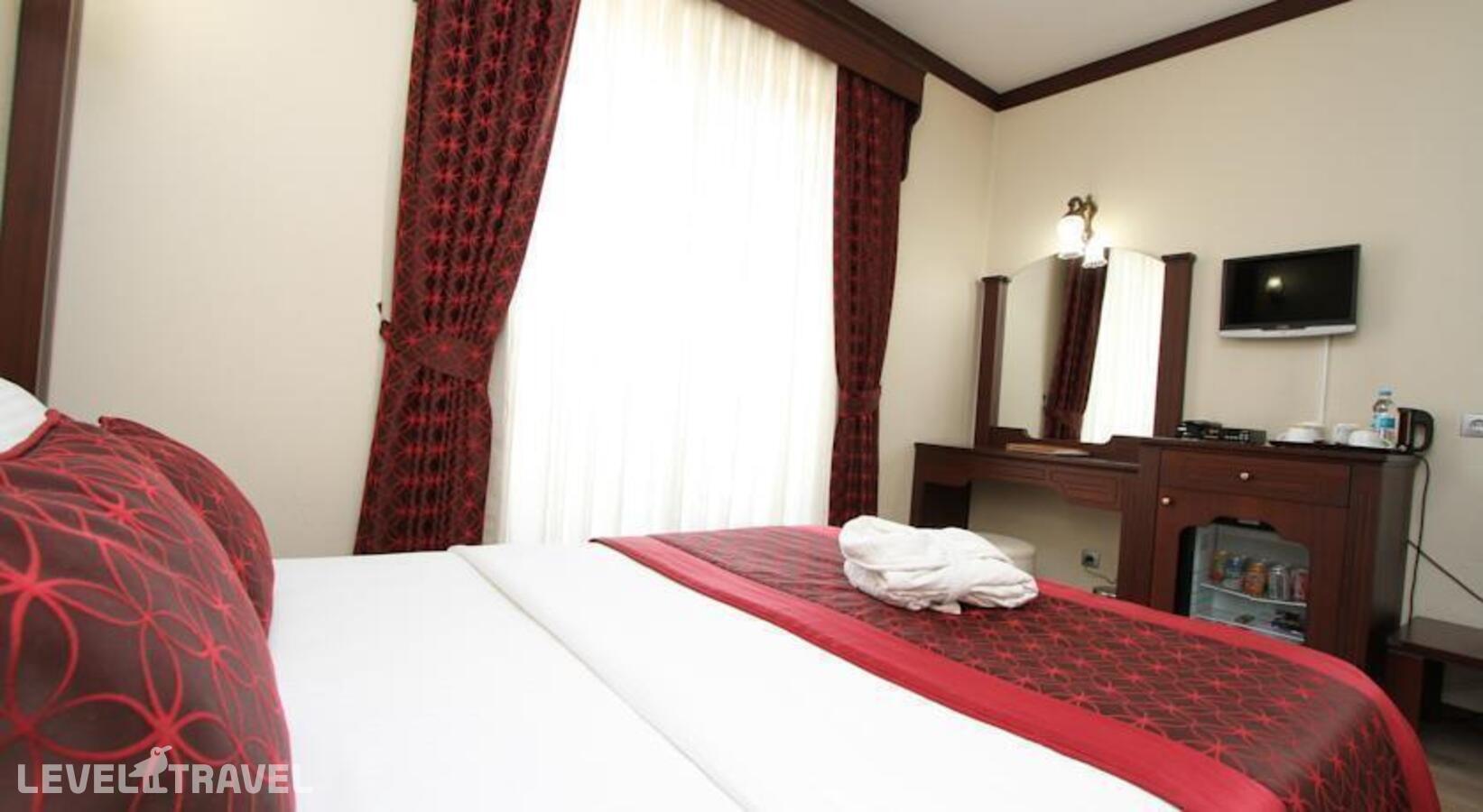 фотографии номера Одноместный улучшенный отеля Gulhanepark Hotel в Турция(Сиркеджи) - фото №7