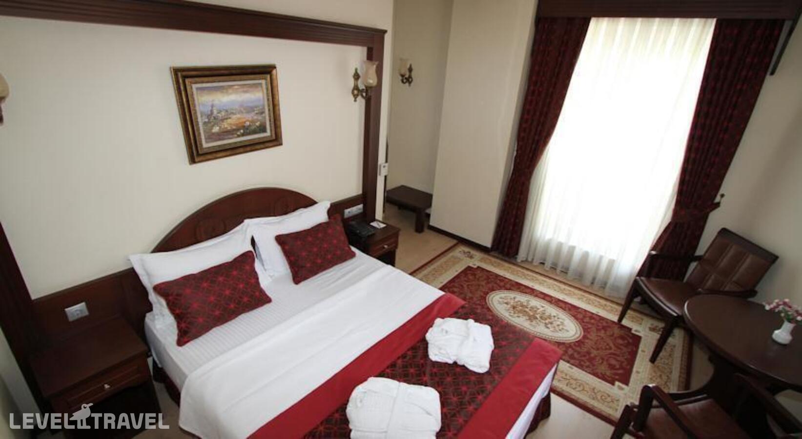 фотографии номера Одноместный улучшенный отеля Gulhanepark Hotel в Турция(Сиркеджи) - фото №4