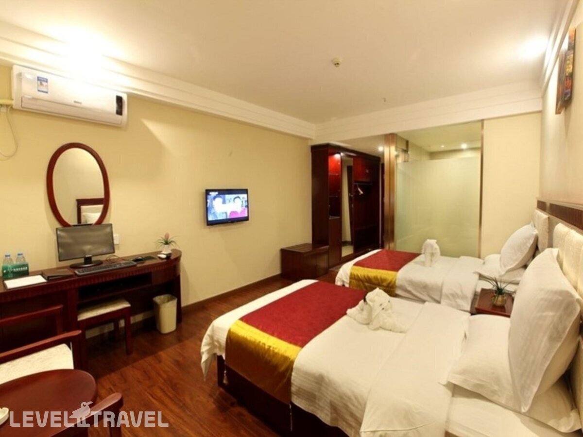 фотографии номера Трехместный номер отеля Greentree Inn Sanya Jiyang Dist Yalongwan Yingbin Ave Hotel в Китай(Санья) - фото №1