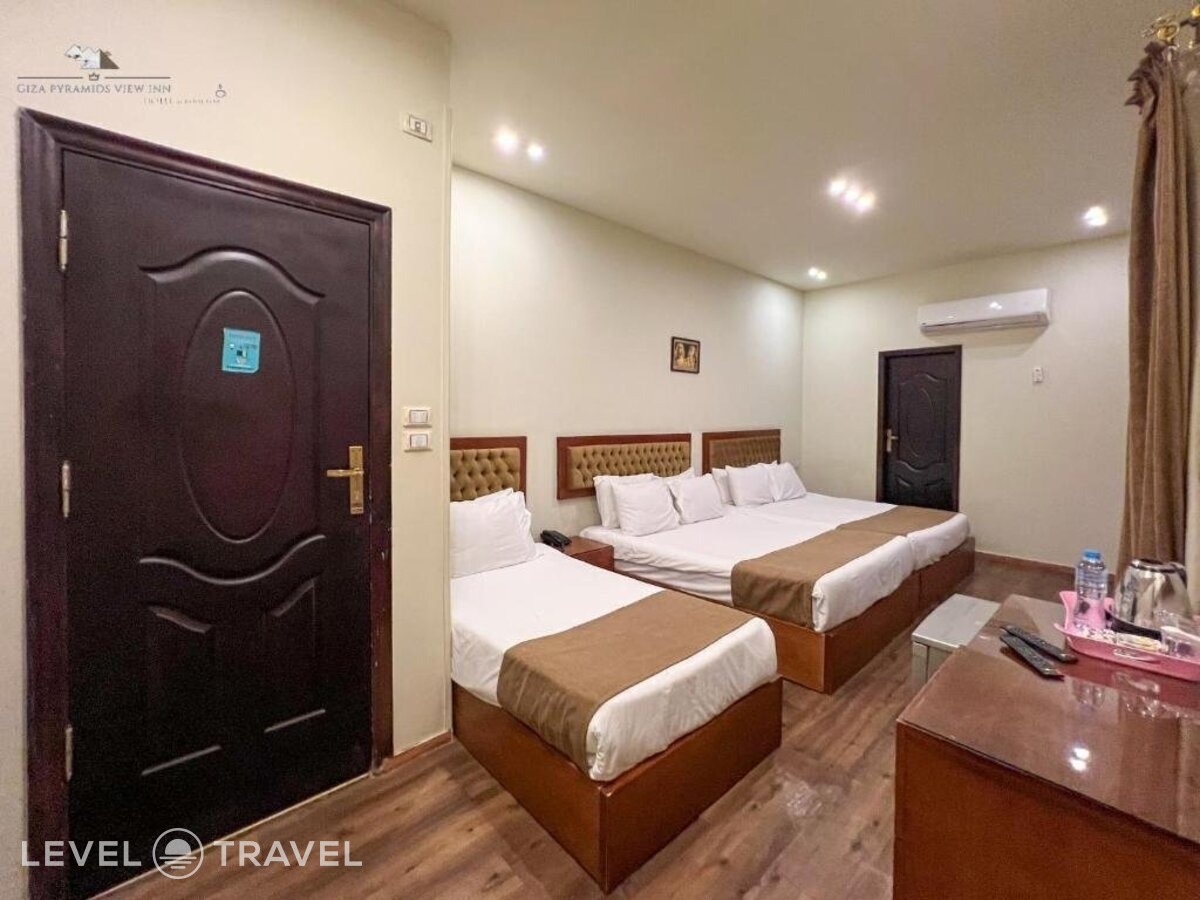 фотографии номера Четырехместный с балконом отеля Giza Pyramids View Inn в Египет(Гиза) - фото №3