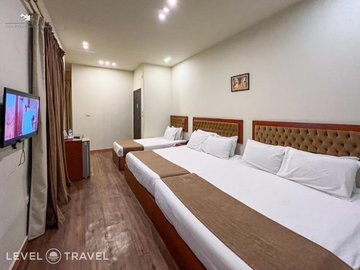 фотографии номера Четырехместный с балконом отеля Giza Pyramids View Inn в Египет(Гиза) - фото №2