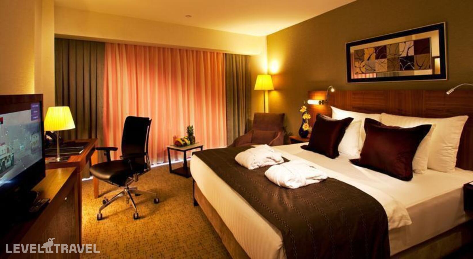 фотографии номера Одноместный номер отеля Crown Plaza Harbiye Hotel в Турция(Шишли) - фото №2