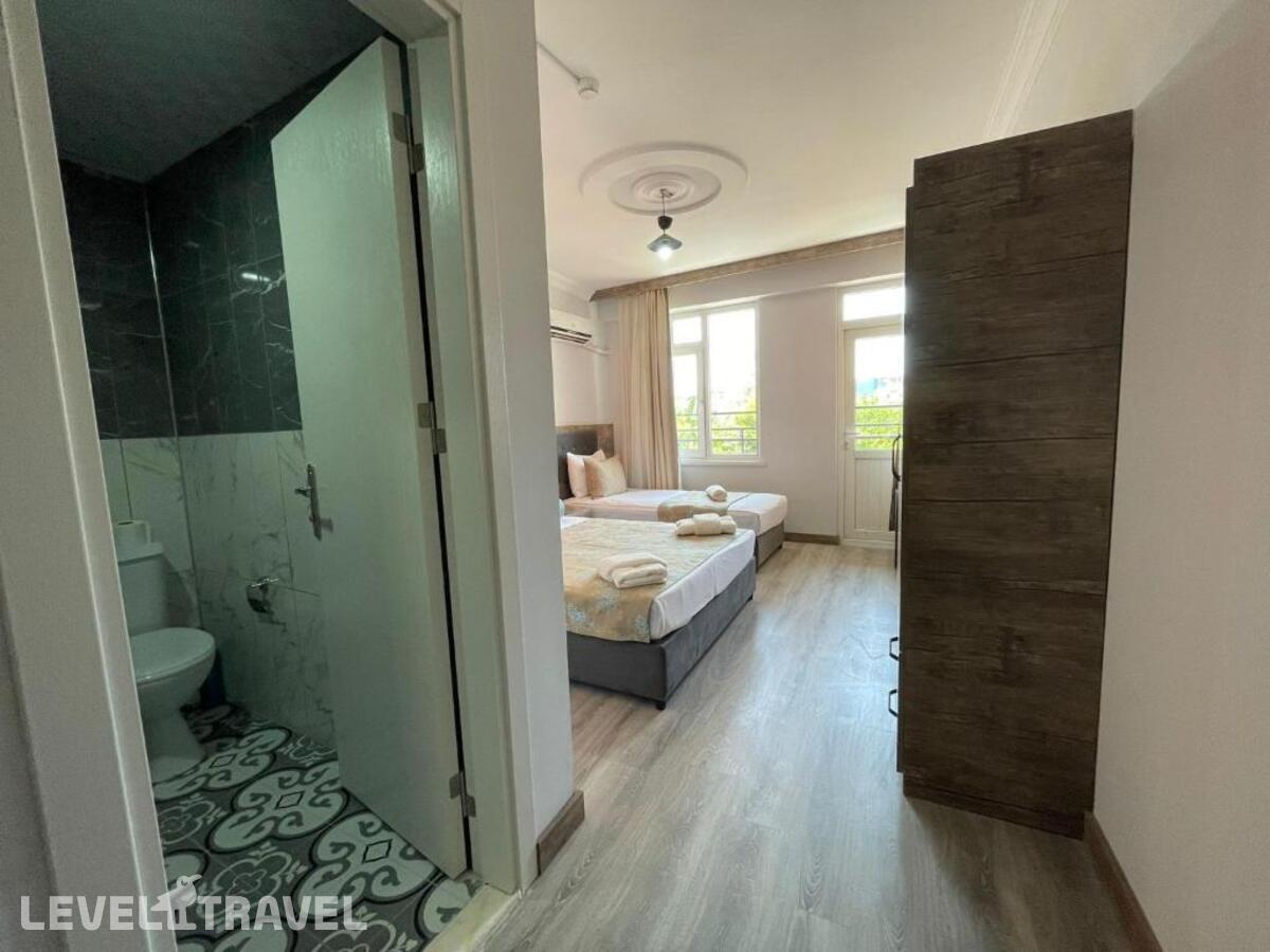 фотографии номера Трехместный номер отеля Seven City Hotel в Турция(Анталья - Центр) - фото №5
