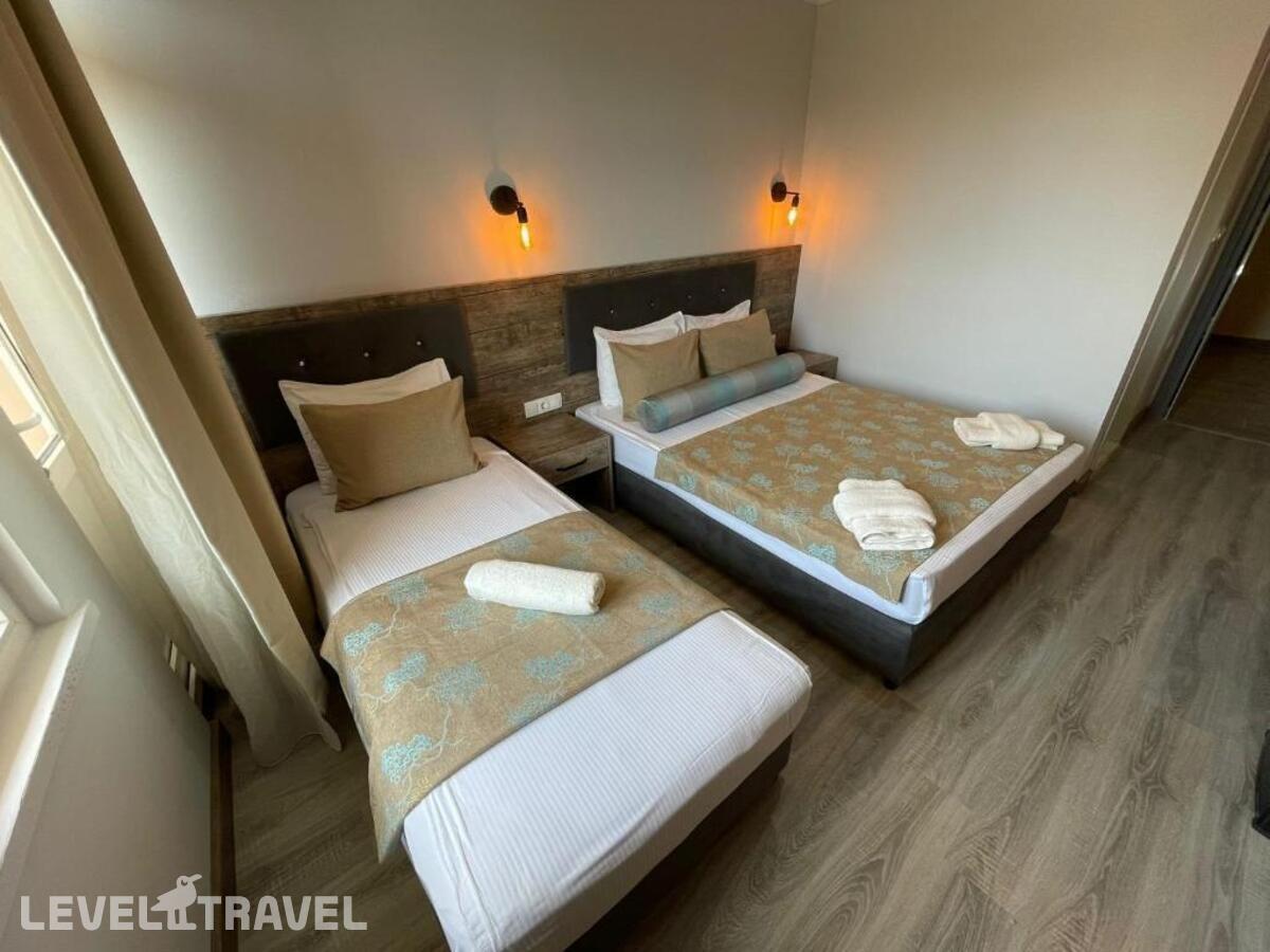 фотографии номера Трехместный номер отеля Seven City Hotel в Турция(Анталья - Центр) - фото №8