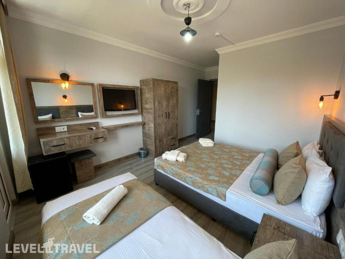 фотографии номера Трехместный номер отеля Seven City Hotel в Турция(Анталья - Центр) - фото №12