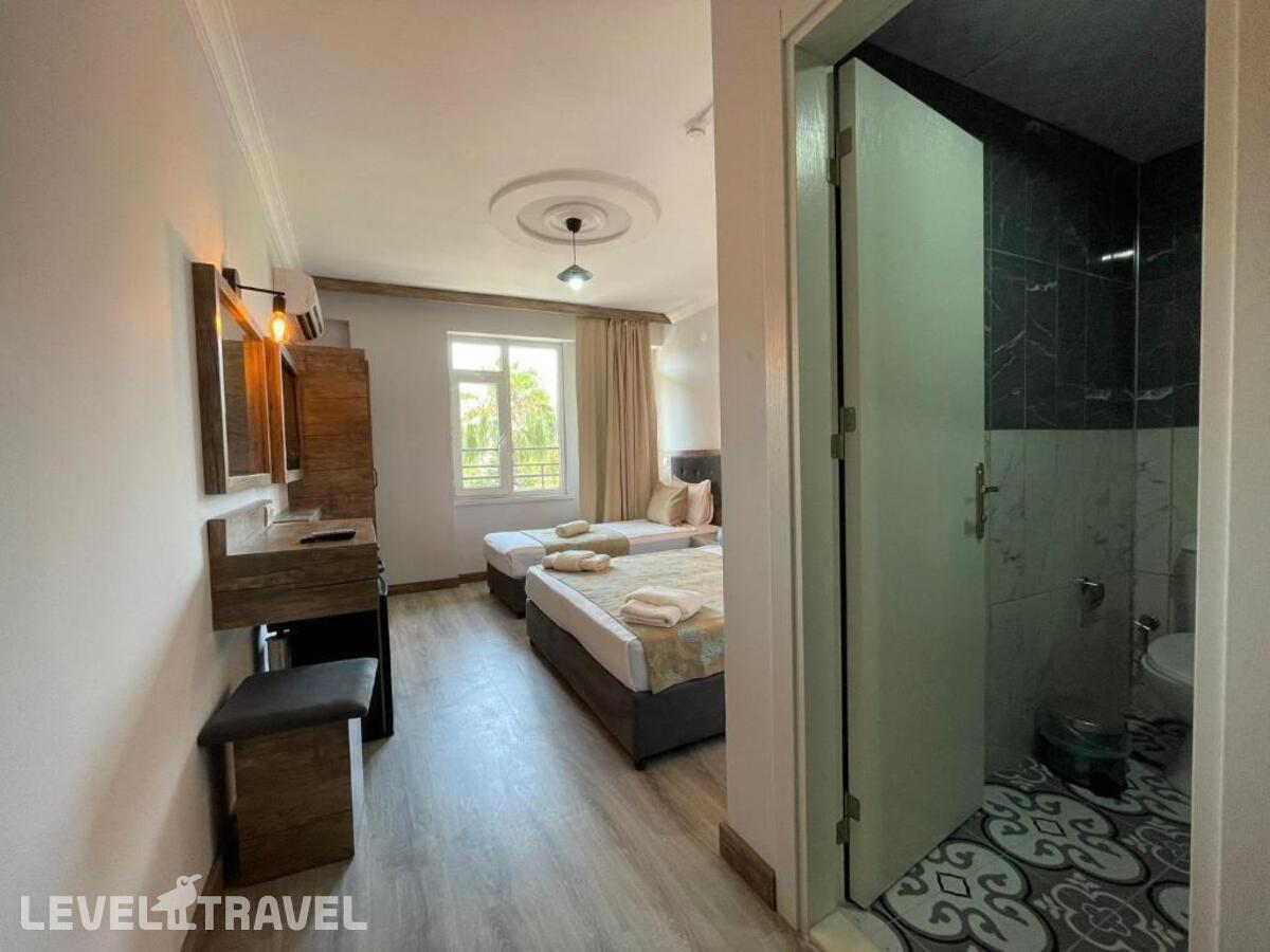 фотографии номера Трехместный номер отеля Seven City Hotel в Турция(Анталья - Центр) - фото №15
