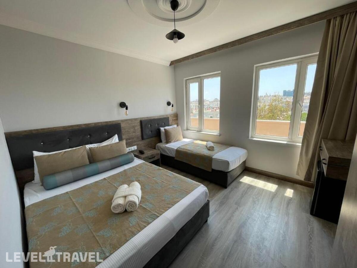 фотографии номера Трехместный номер отеля Seven City Hotel в Турция(Анталья - Центр) - фото №7