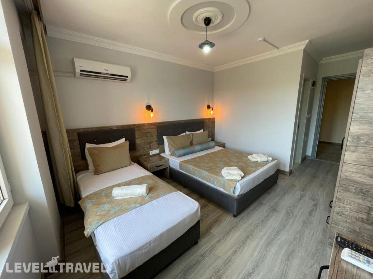 фотографии номера Трехместный номер отеля Seven City Hotel в Турция(Анталья - Центр) - фото №2