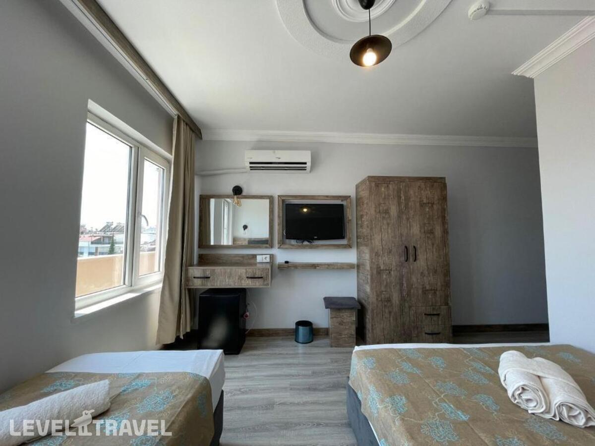 фотографии номера Трехместный номер отеля Seven City Hotel в Турция(Анталья - Центр) - фото №18
