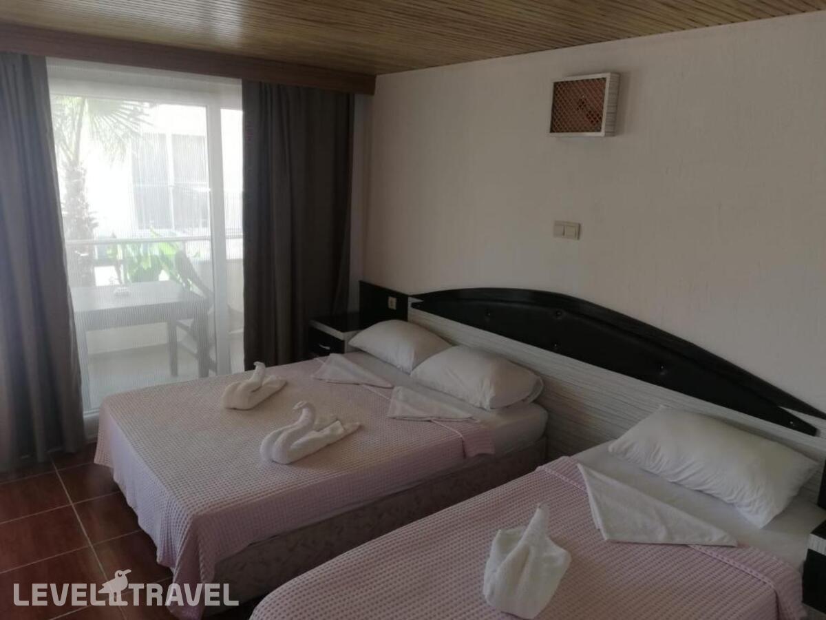 фотографии номера Трехместный делюкс отеля Esmeralda Butik Hotel в Турция(Кызылот) - фото №3