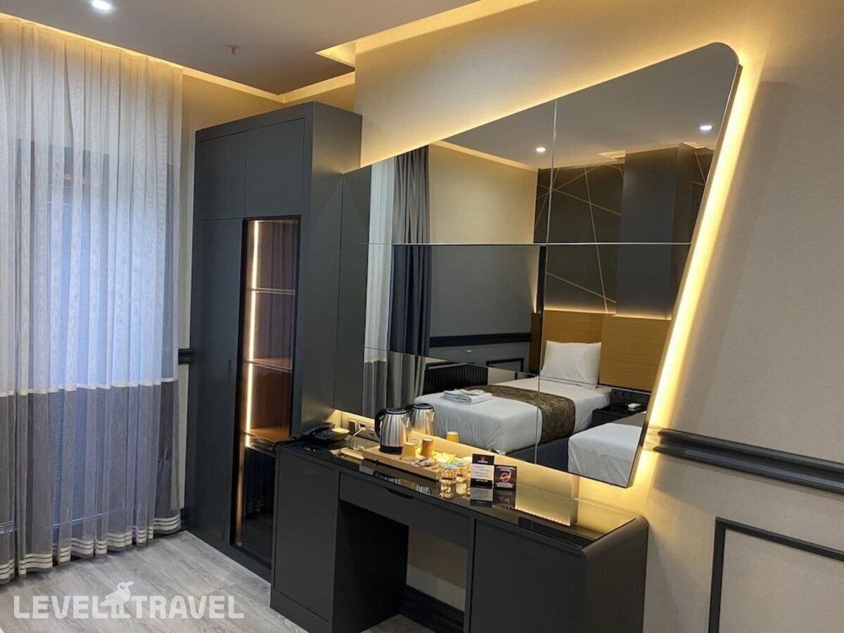 фотографии номера Делюкс отеля Confores Hotel в Турция(Бахчелиэвлер) - фото №4