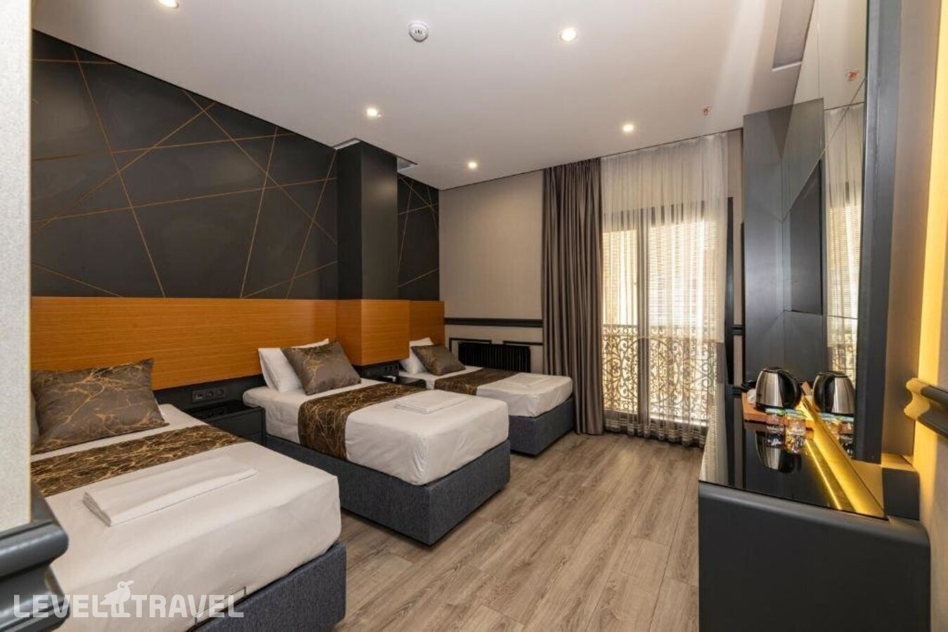фотографии номера Трехместный делюкс отеля Confores Hotel в Турция(Бахчелиэвлер) - фото №1