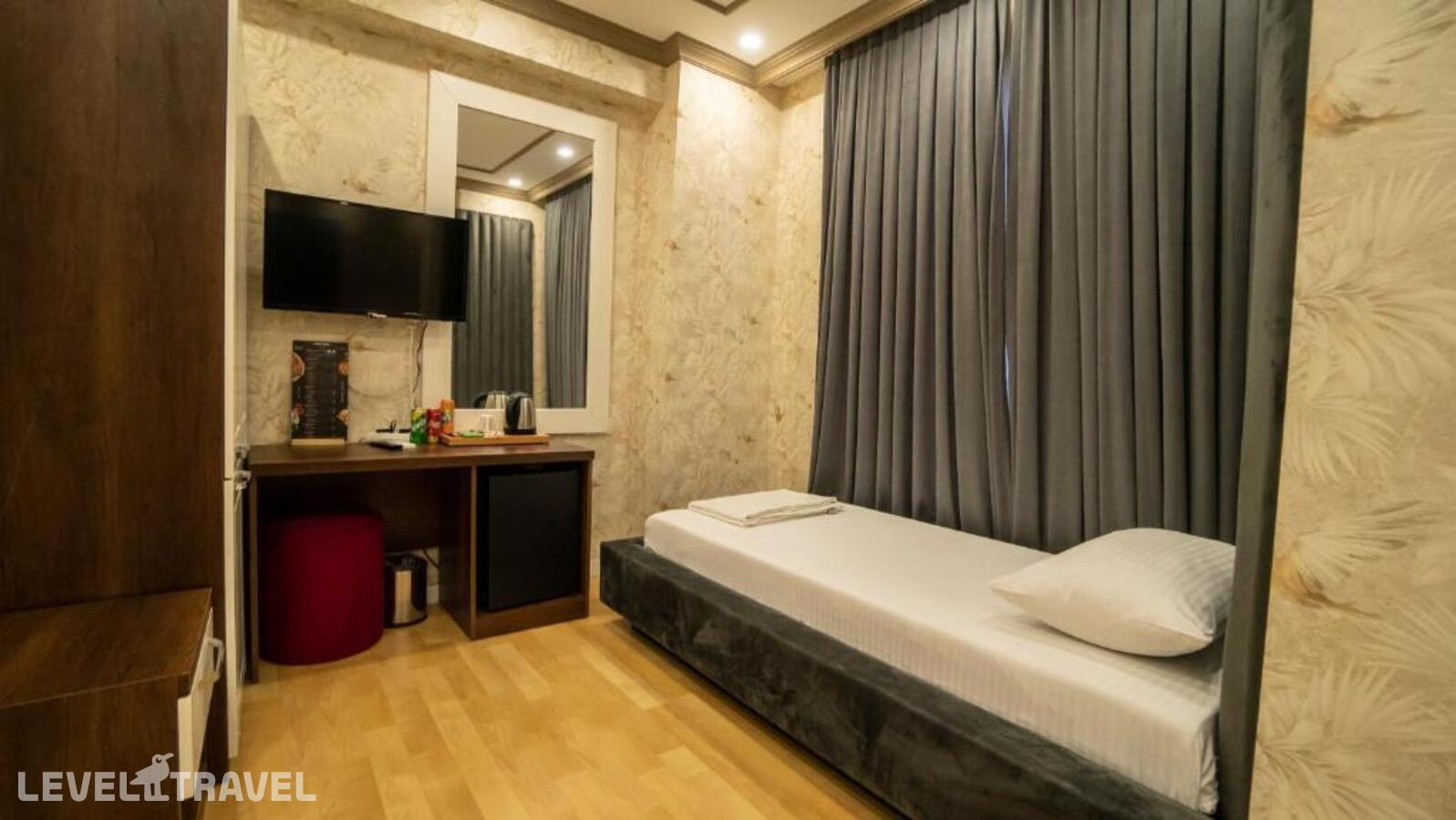фотографии номера Семейный номер отеля Dymar Hotel в Турция(Кючюкчекмедже) - фото №8