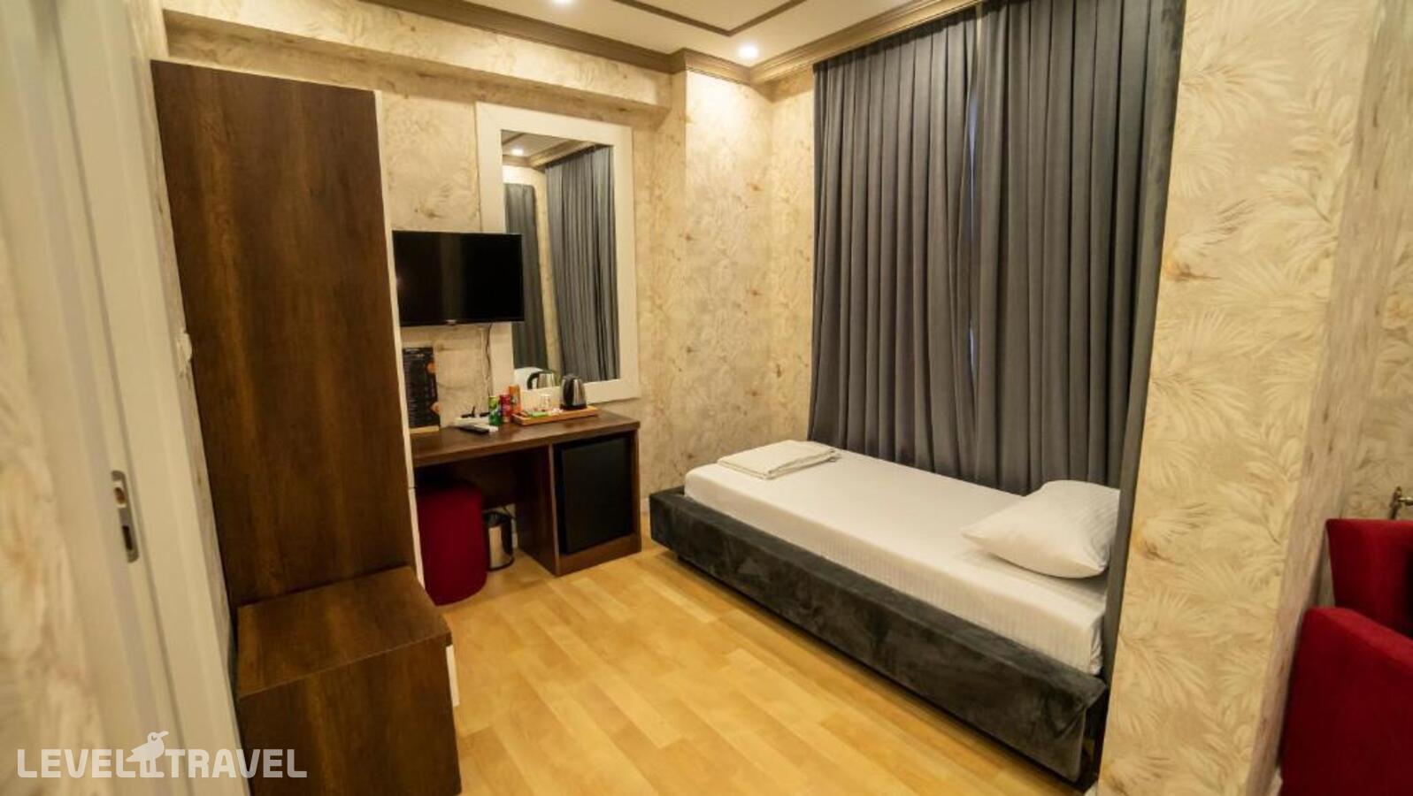 фотографии номера Семейный номер отеля Dymar Hotel в Турция(Кючюкчекмедже) - фото №7