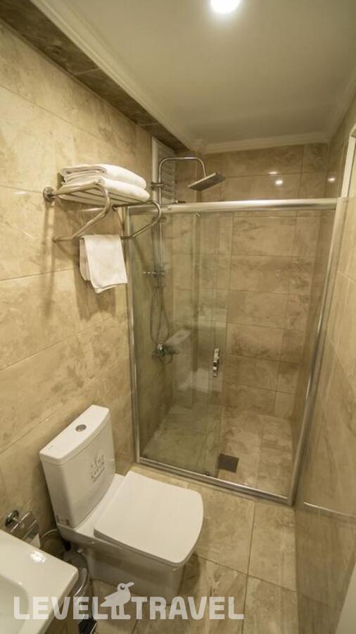 фотографии номера Трехместный улучшенный отеля Dymar Hotel в Турция(Кючюкчекмедже) - фото №3
