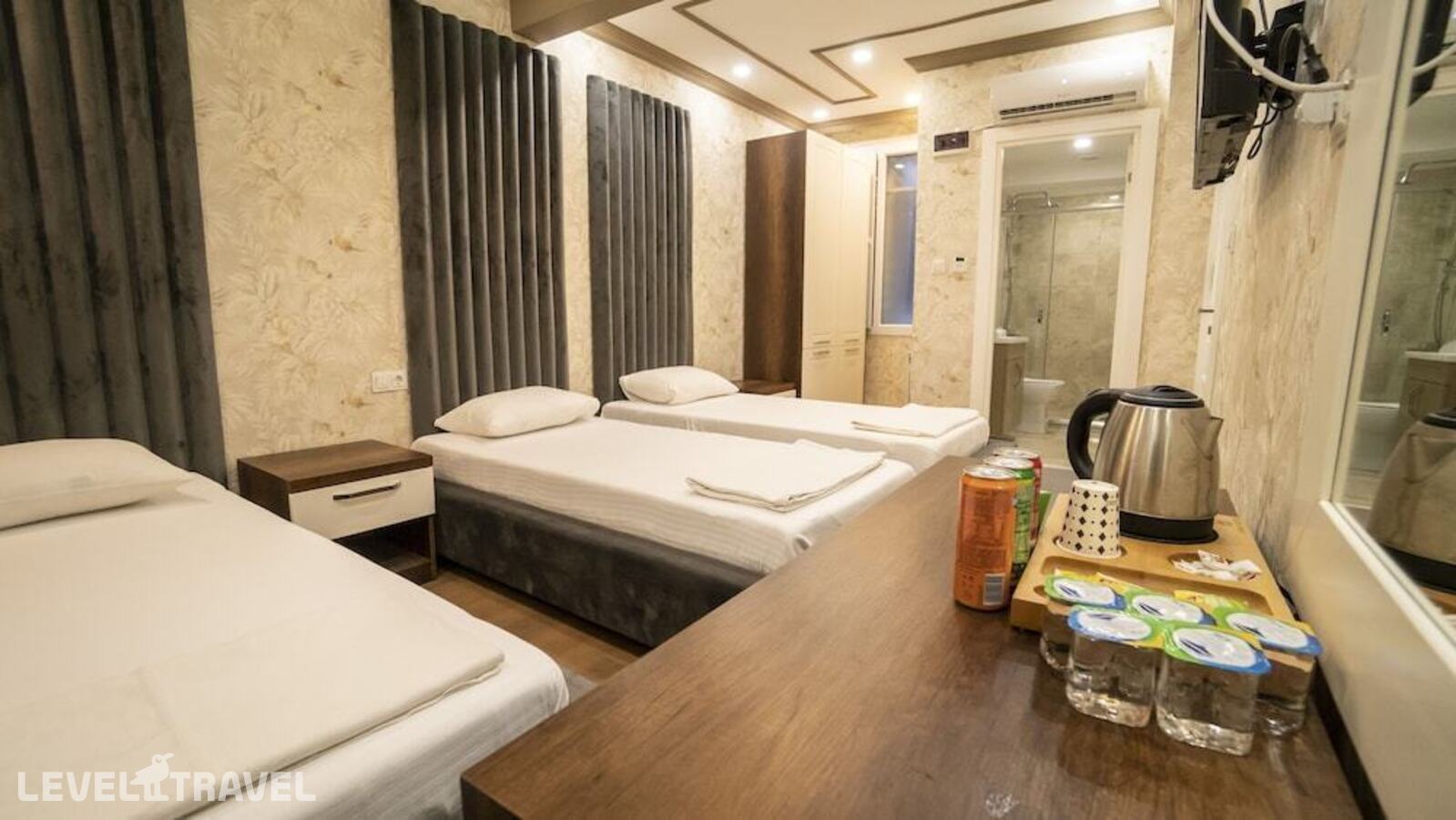 фотографии номера Трехместный улучшенный отеля Dymar Hotel в Турция(Кючюкчекмедже) - фото №1