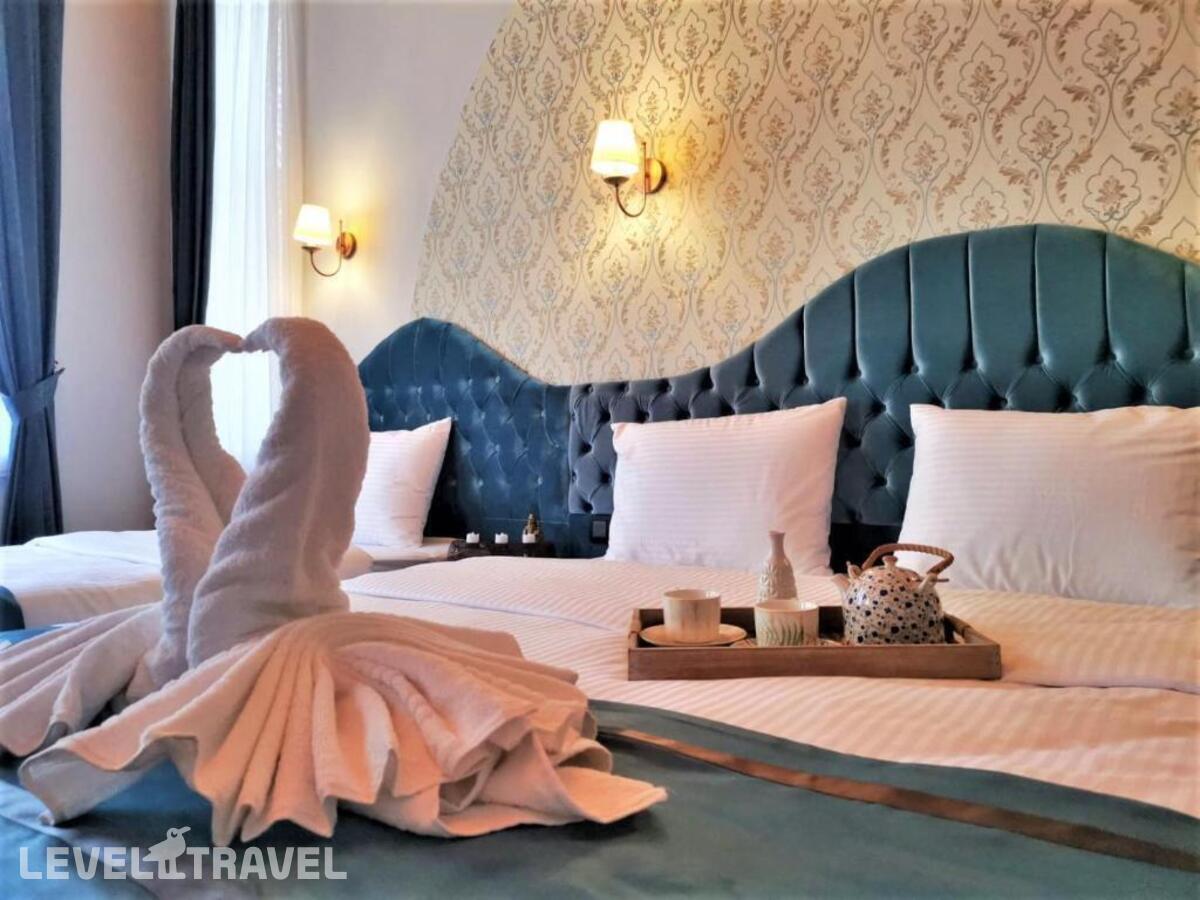 фотографии номера Трехместный делюкс отеля The Independent Hotel Taksim в Турция(Бейоглу) - фото №1
