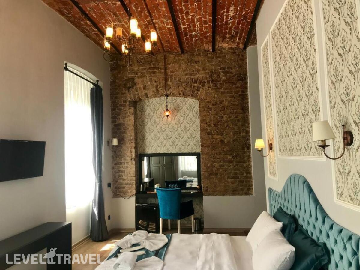 фотографии номера Трехместный делюкс отеля The Independent Hotel Taksim в Турция(Бейоглу) - фото №2